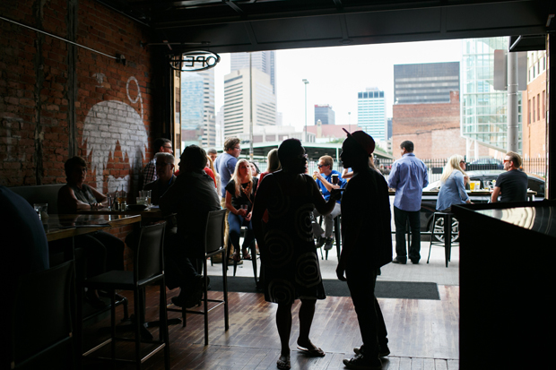 The Walrus in downtown Columbus has an open garage that leads to an outdoor patio.